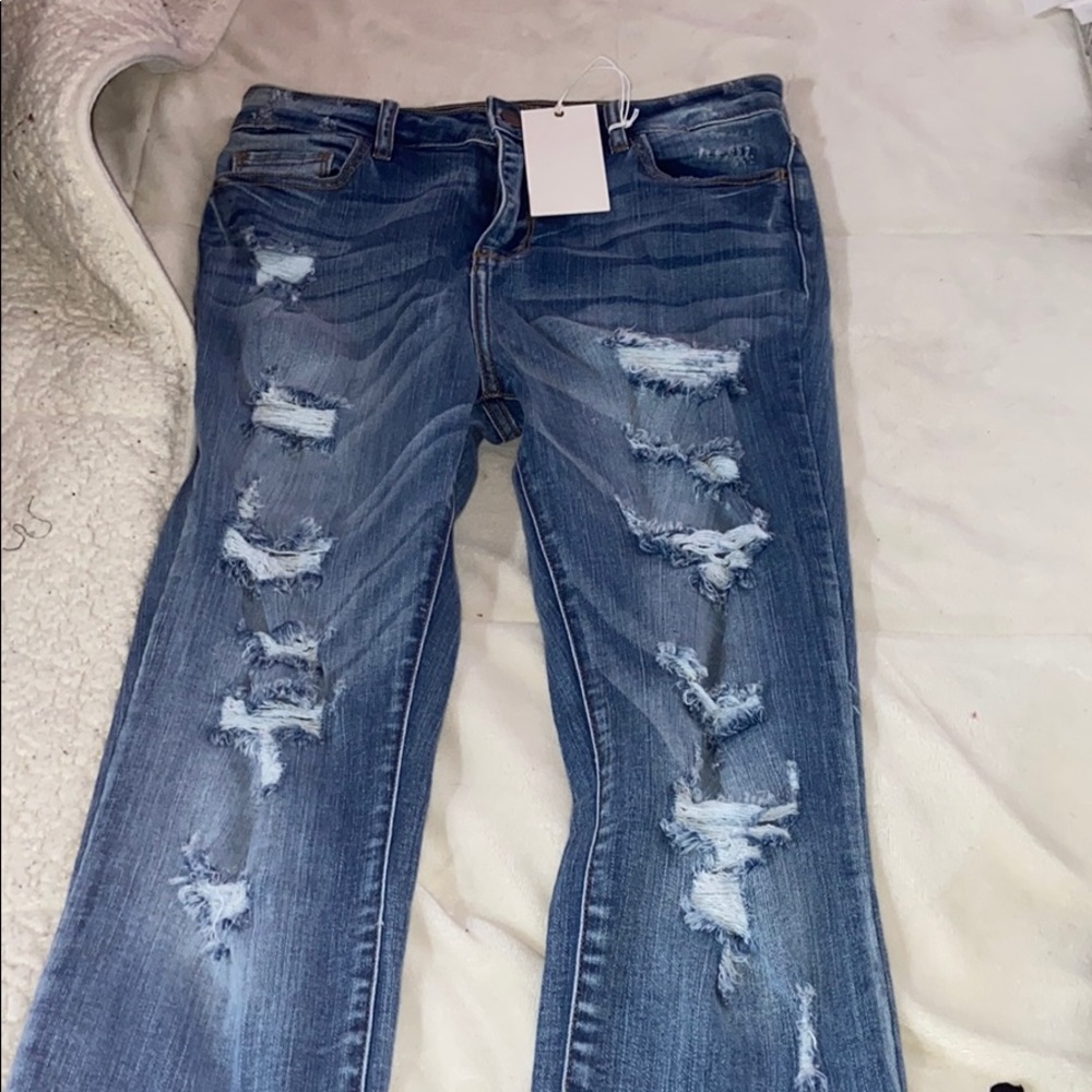 Distressed blue jeans